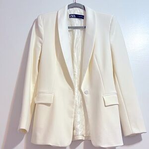 A white Suit from Zara Brand, it was not wearing by one time.